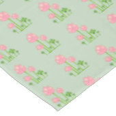 Mooie roze bloemen op lichtgroene tablet tafelkleed (Gekanteld)