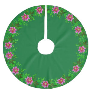 Mooie roze goud roze bloemenguirlande op groen kerstboom rok