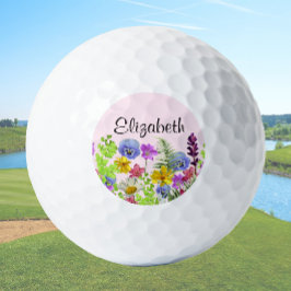 Mooie roze wilde bloemen met de naam van vrouwen golfballen