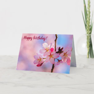 Mooie Sakura-bloemen op een verticale tak Kaart