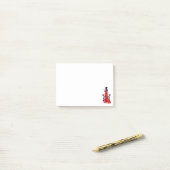 Mooie silhouet van jonge vrouw met wijnglas post-it® notes (Op bureau)