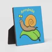 Mooie slak op een bladtekening van de cartoon fotoplaat (Voorkant)