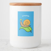 Mooie slak op een bladtekening van de cartoon voedselcontainer etiket (Voorkant)