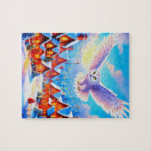 Mooie sneeuwuil die over kerstdorp vliegt legpuzzel (Horizontaal)