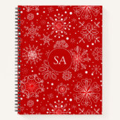 Mooie sneeuwvlokken op rode achtergrond met kerstm notitieboek (Voorkant)