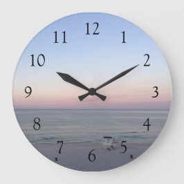 Mooie strand zonsondergang grote klok