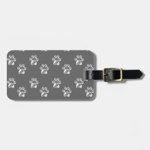 Mooie trendy paw-patroon op donkergrijs bagagelabel