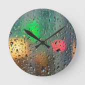 Mooie uitzicht door de regen ronde klok (Voorkant)