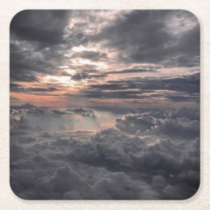 Mooie uitzicht van boven de wolken kartonnen onderzetters