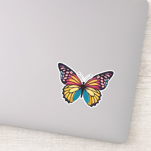 Mooie veelkleurige vlinder sticker (Detail)