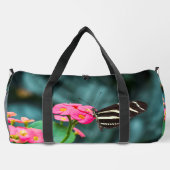 Mooie vlinder op een roze bloem plunjezak (Achterkant)