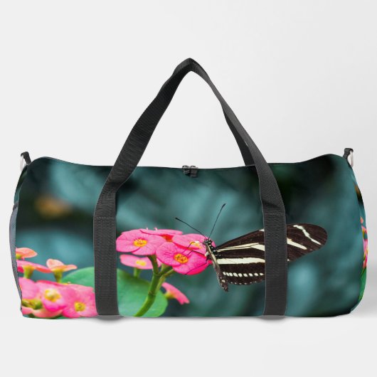 Mooie vlinder op een roze bloem plunjezak (Achterkant)