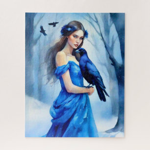 Mooie vrouw met een raaf, in een besneeuwd bos legpuzzel