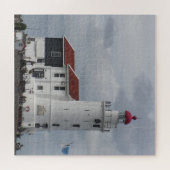 Mooie vuurtoren op de rotsen legpuzzel (Horizontaal)