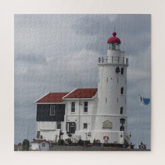 Mooie vuurtoren op de rotsen legpuzzel (Verticaal)