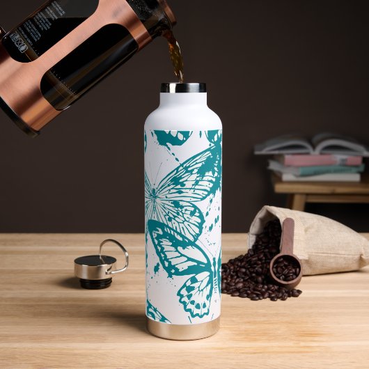Mooie weergave van blauwe omlijnde vlinders waterfles (Koffie)