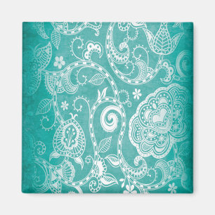 Mooie witte en blauwe bloemen, bladeren en zeugen magneet