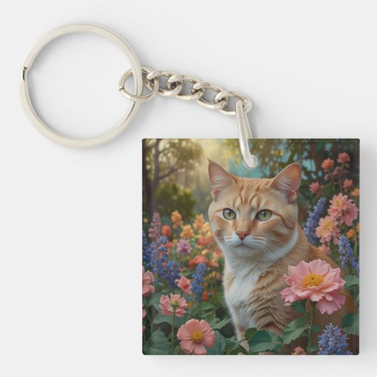 Mooie witte oranje kat in bloementuin sleutelhanger (voorkant)