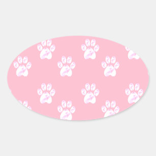 Mooie witte pootpatroon op roze ovale sticker