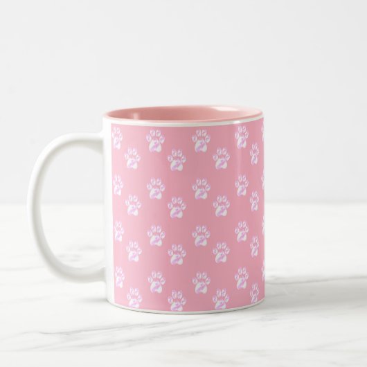 Mooie witte poten op roze tweekleurige koffiemok (Links)