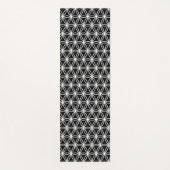 Mooie witte ventilator met levenspatroon op zwart yogamat (Voorkant)