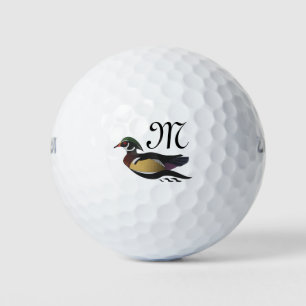 Mooie Wood Duck zwemmen Golfballen