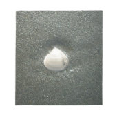 Mooie zeeschelp in het zand: een zout souvenir notitieblok (Voorkant)