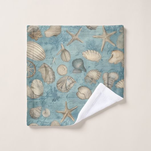 Mooie zeeschelpen in blauw bad handdoek (Wasdoekje)