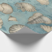 Mooie  zeeschelpen in blauw cadeaupapier (Hoek)
