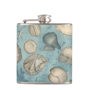 Mooie zeeschelpen in blauw heupfles