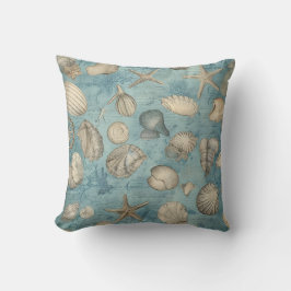 Mooie  zeeschelpen in blauw kussen