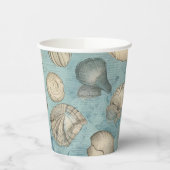 Mooie zeeschelpen in blauw papieren bekers (Links)