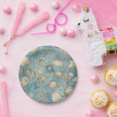 Mooie  zeeschelpen in blauw papieren bordje (Feest)