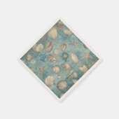 Mooie  zeeschelpen in blauw servet (Hoek)