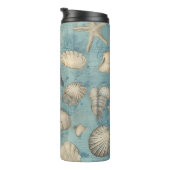 Mooie zeeschelpen in blauw thermosbeker (Geroteerd rechts)