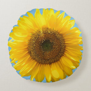 Mooie zonnebloem op lichte turquoise ronde kussen
