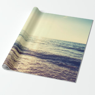 Mooie zonsondergang met zee en strand - en cadeaupapier