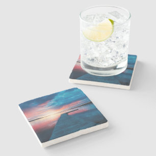 Mooie zonsondergang op een rustig meer stenen onderzetter