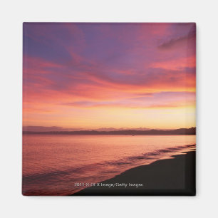 Mooie zonsondergang op het strand magneet