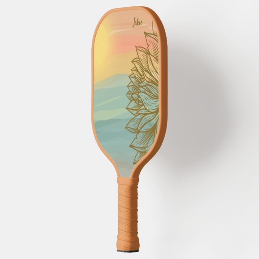 Mooie zonsondergang over de drijvende wateren pickleball paddle (Links)