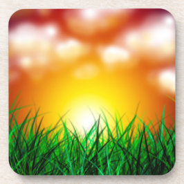 Mooie zonsopgang over een grasveld bier onderzetter