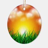 Mooie zonsopgang over een grasveld keramisch ornament (Links)