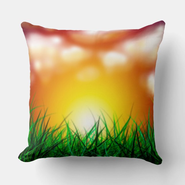 Mooie zonsopgang over een grasveld kussen (Voorkant)