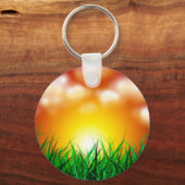 Mooie zonsopgang over een grasveld sleutelhanger (Voorkant)