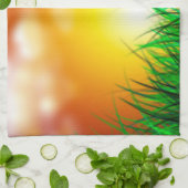 Mooie zonsopgang over een grasveld theedoek (Gevouwen)