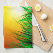 Mooie zonsopgang over een grasveld theedoek (Quarter Fold)