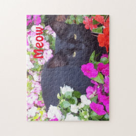 Mooie zwarte kat met groene ogen in bloemen legpuzzel