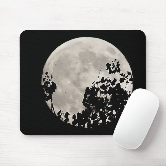 Moon achter donkere bladeren muismat (Met muis)