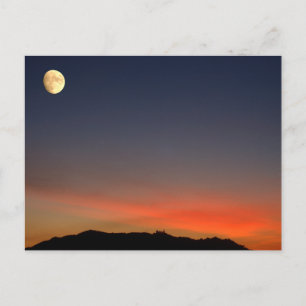 Moonrise over zonsondergang briefkaart