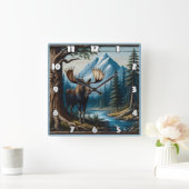 Moose bij rivier met bergen achter vierkante klok (Huis)